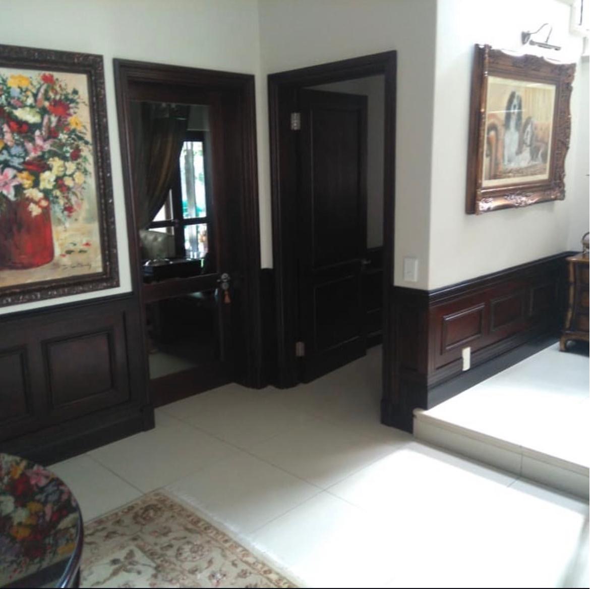 Luxury Interior — Dark Wood Panelling & Doors